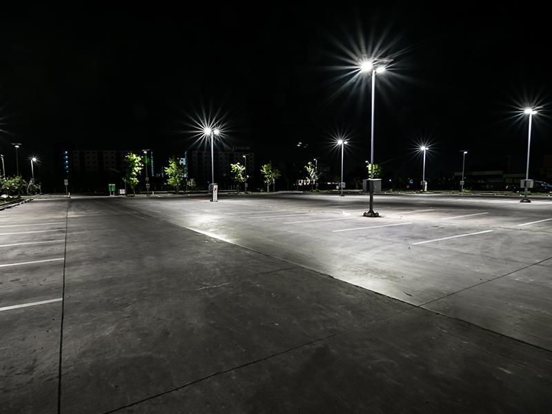 commercial parking lot at night with new lighting system installed apache junction az